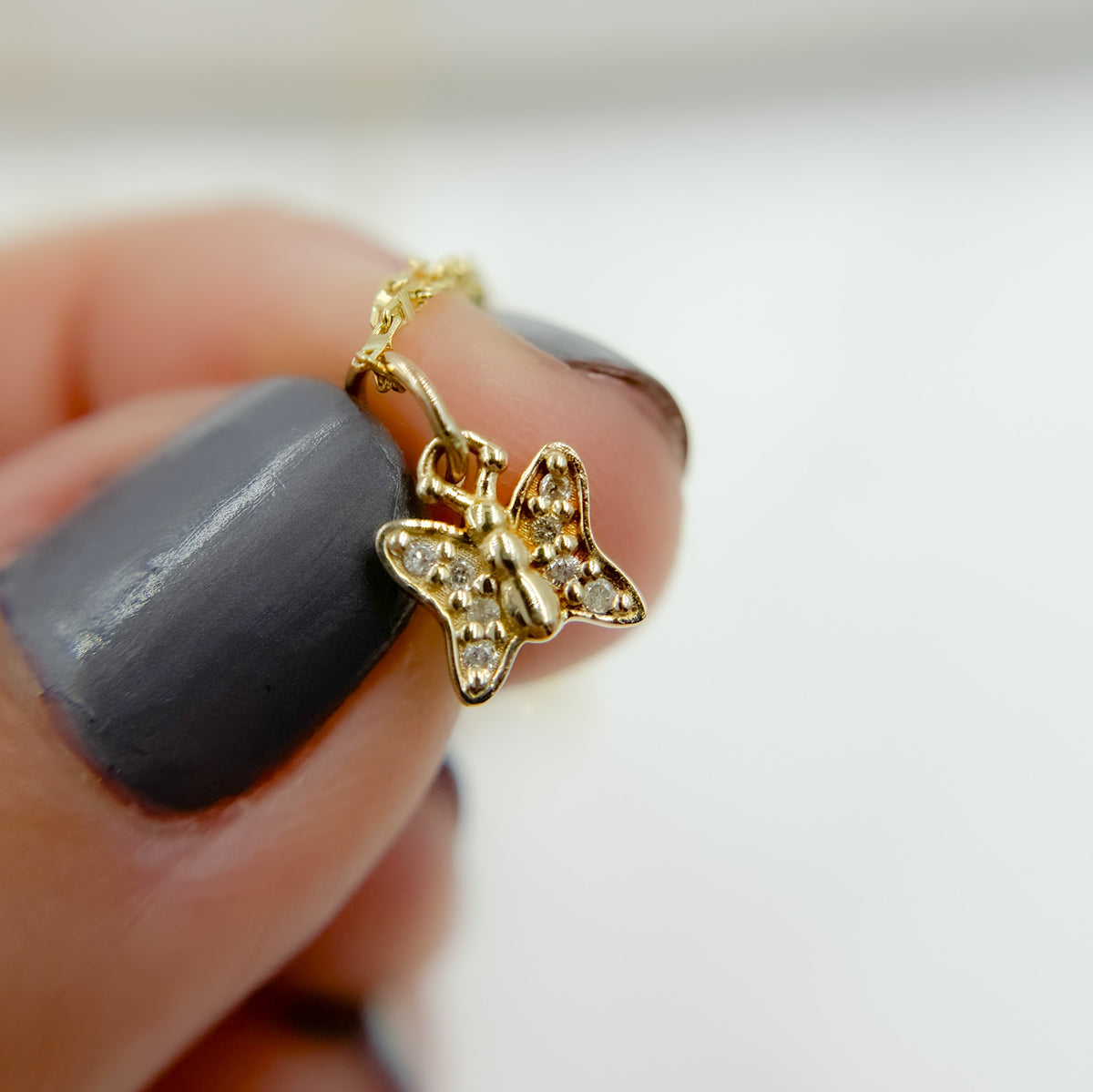 14k Solid Gold Diamonds Butterfly Charm. GDP263