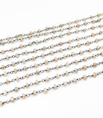 Load image into Gallery viewer, Coated Peach Moonstone Wire Wrap Chain. CMS35
