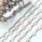 Load image into Gallery viewer, Coated Peach Moonstone Round Shape Bezel Oxidized Wire Chain. CMS17
