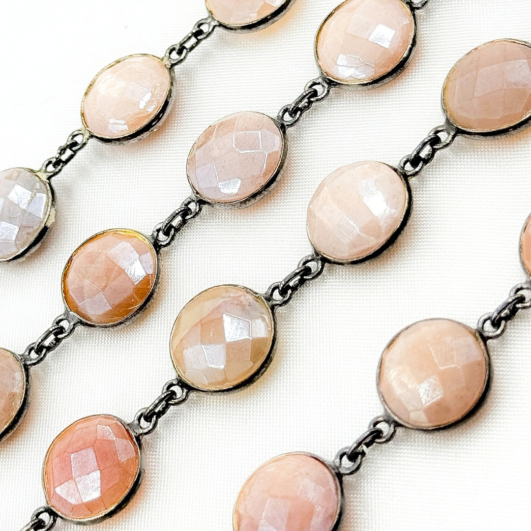 Coated Peach Moonstone Round Shape Bezel Oxidized Wire Chain. CMS111